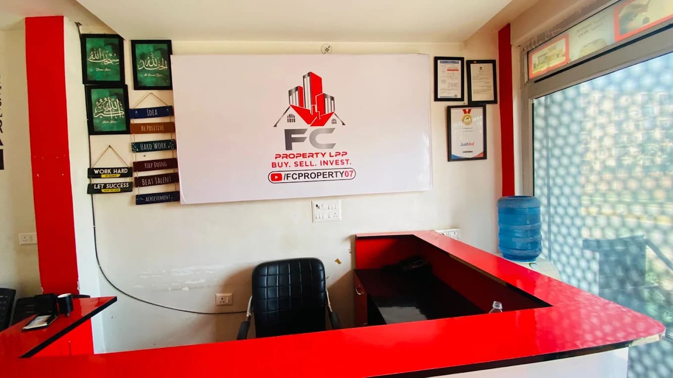 Reception at the FC PROPERTY LLP office, with the company logo on the wall